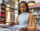 Young woman shopping for records